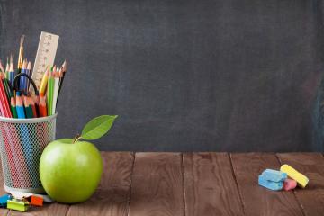 School and Office Supplies on Classroom Table